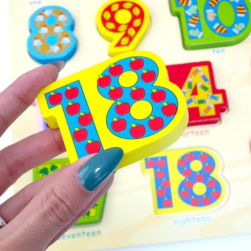 wooden number puzzle board featuring numbers 1 to 20